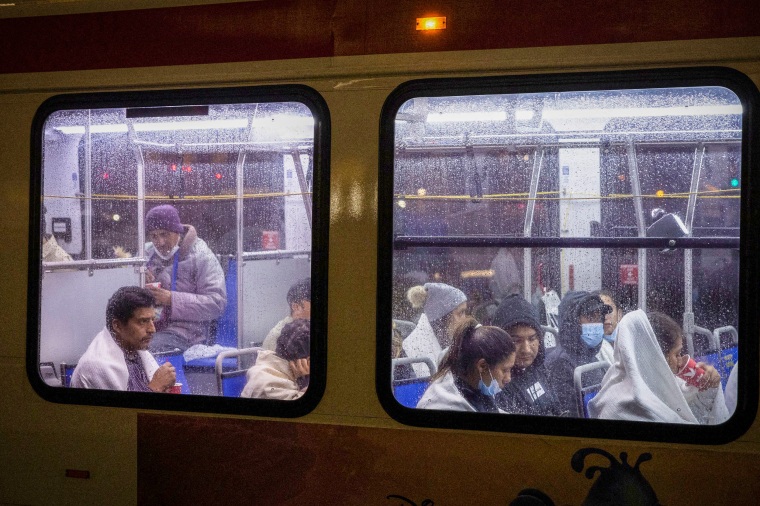 Migrants in a bus.