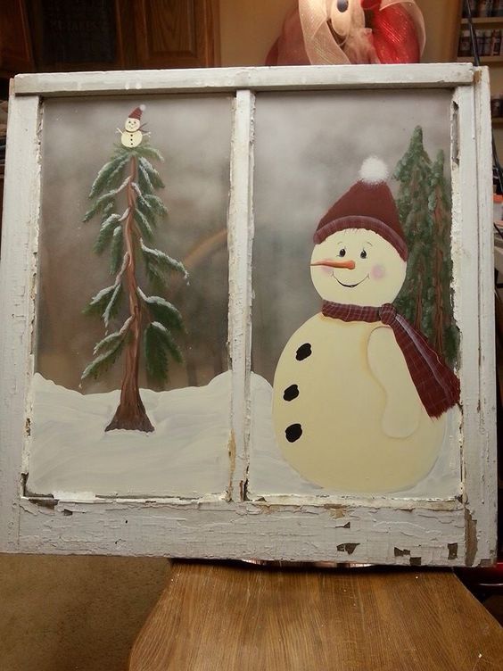 Old window with snowman.