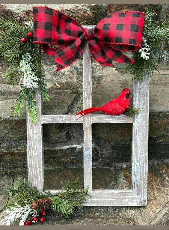 Wooden window with red and black bow.