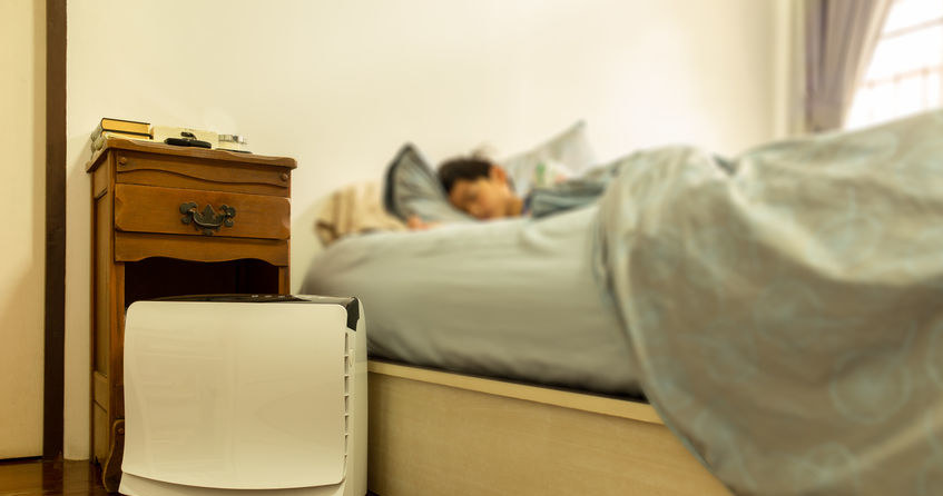 An air purifier in the bedroom allows for healthy sleep