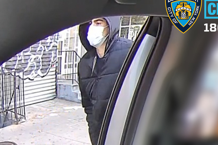 A person of interested wanted for questioning in the shooting of UnitedHealthcare CEO Brian Thompson is shown walking in a new image released Saturday by New York City police.