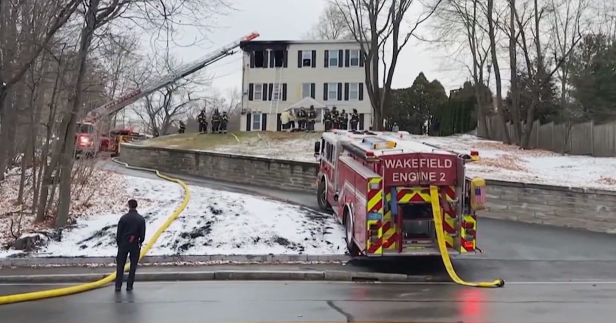 Woman dies after being pulled from MA house fire; man expected to survive