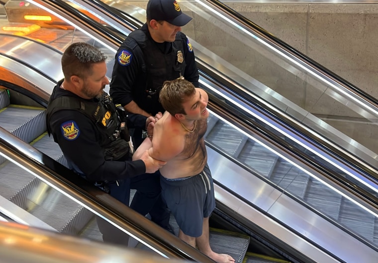 Police arrest a man who allegedly arrived at Sky Harbor with numerous gun