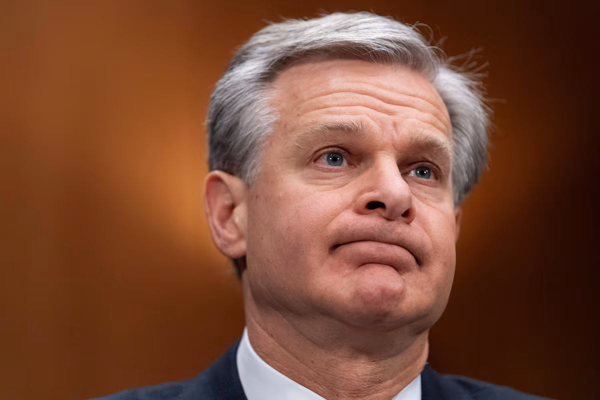 After criticism from Trump, FBI director says he will step down at the end of Biden's term