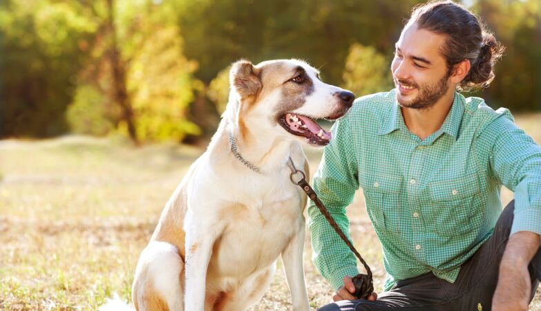 Dog and Man have been friends for longer than we thought