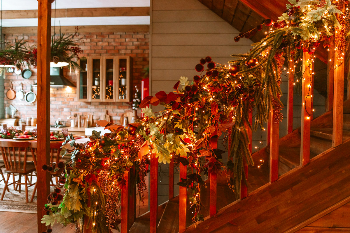 Decorate the interior stairs for Christmas.