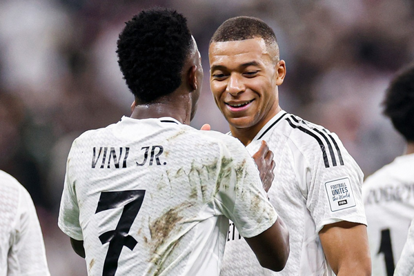 Vini Jr and Mbappe celebrating the first goal of the match
