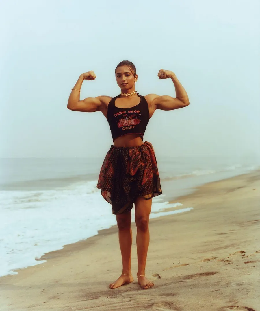 Four muscular women defying norms while flexing their heroic shapes