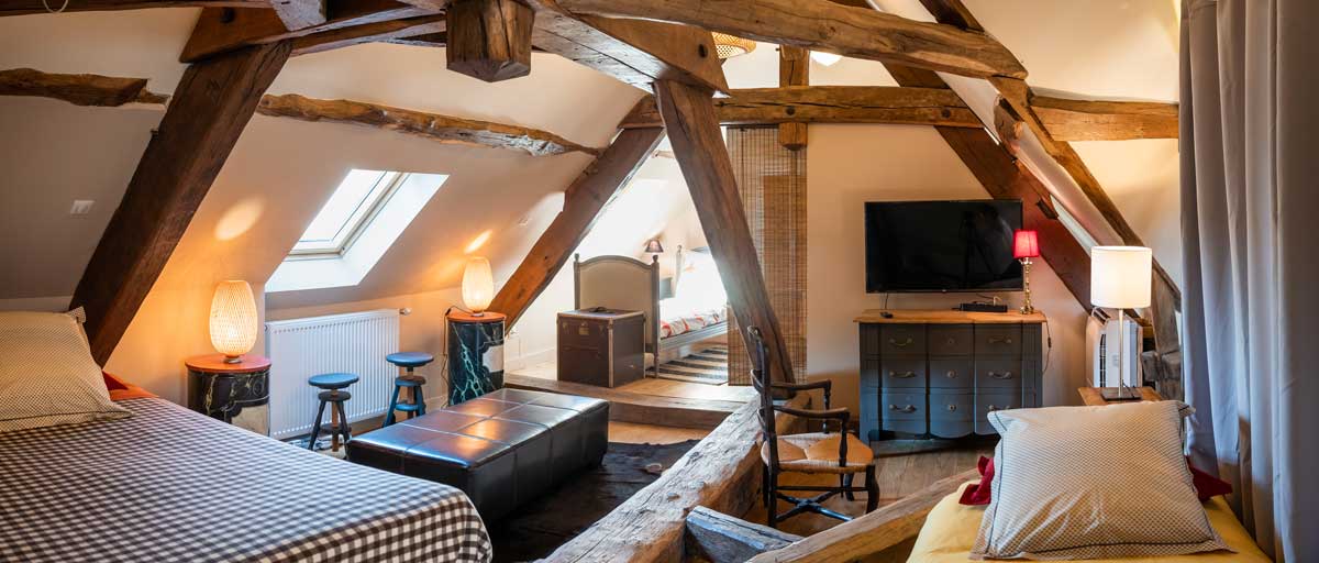 Furnish the attic in a rustic style.
