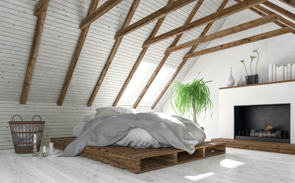 Beautiful bed with pallets in a rustic style room.