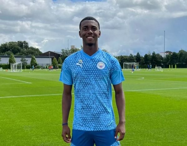 Roger Gabriel posted dressed in the Manchester City uniform