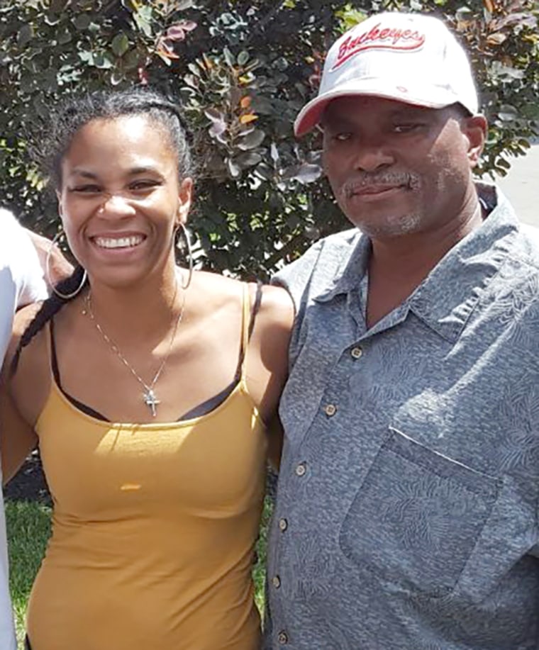 Christyn Akin-Crockett with her father in 2016.