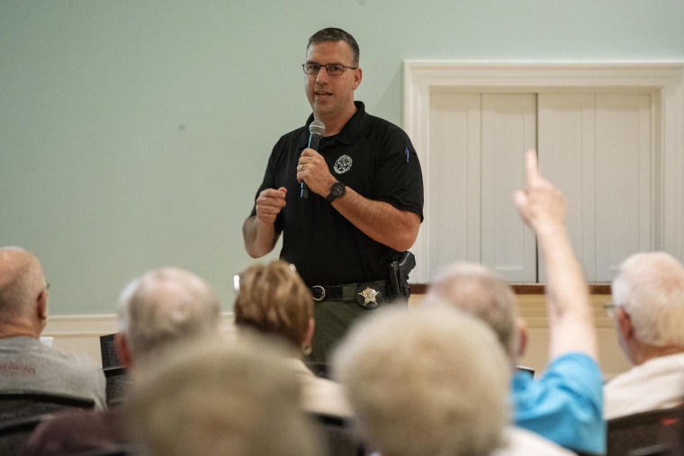 Beaufort County Sheriff’s Office Lt. Eric Calendine takes questions from Sun City residents about cryptocurrency scams 