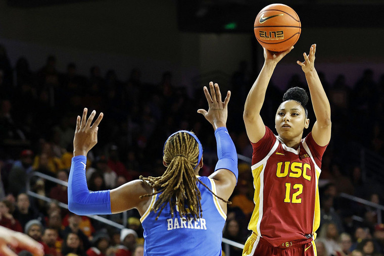 JuJu Watkins #12 of the USC Trojans shoots against Janiah Barker of UCLA on Feb. 13, 2025 in Los Angeles.