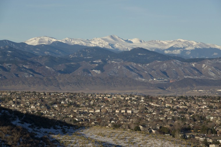 Highlands Ranch Colorado homes snowy Rocky Mountains