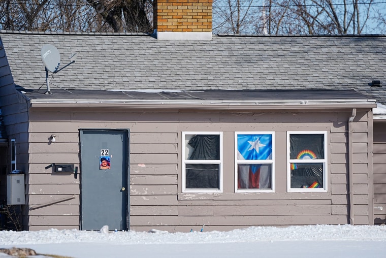 Puerto Rican and rainbow flags hang in memory of Sam Nordquist at Patty’s Lodge 