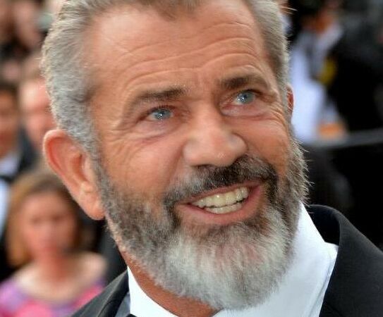 The actor Mel Gibson smiling.