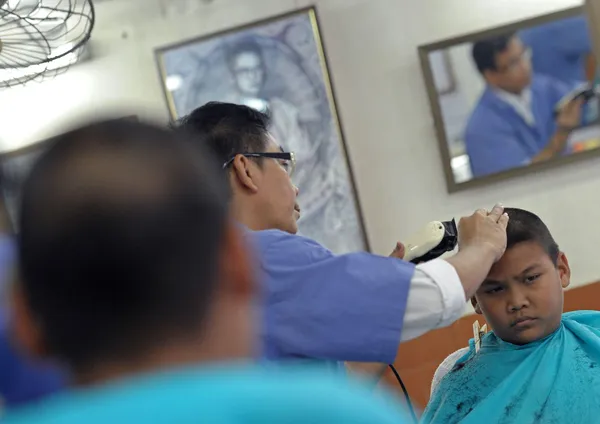This country took 50 years to change the rules on the student's hair length