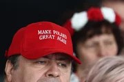 Man wears a red cap with the sayings “Make Poland Great Again” (make Poland great again) participates in the Conservative Political Action Conference (CPAC) in Jasionka, Poland, May 27, 2025