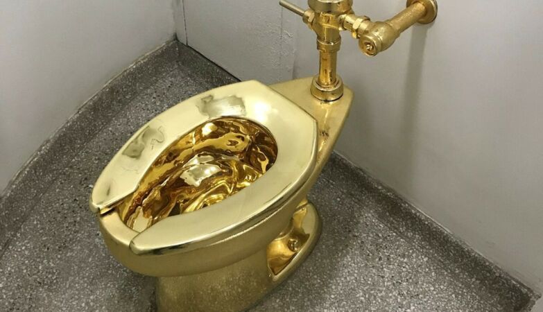 The incredible history of the 6 million gold toilet that was stolen from a British palace