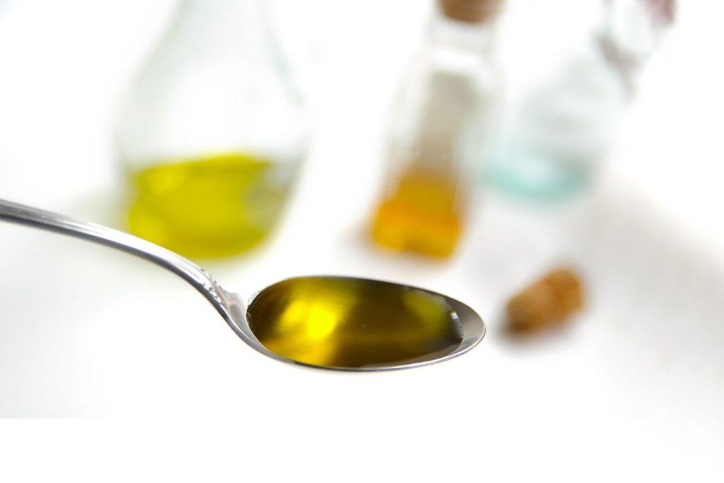 When can olive oil on an empty stomach damage?