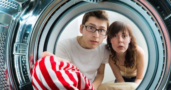 No soda or vinegar. Put it into the washing machine and you will get rid of the ugly smell
