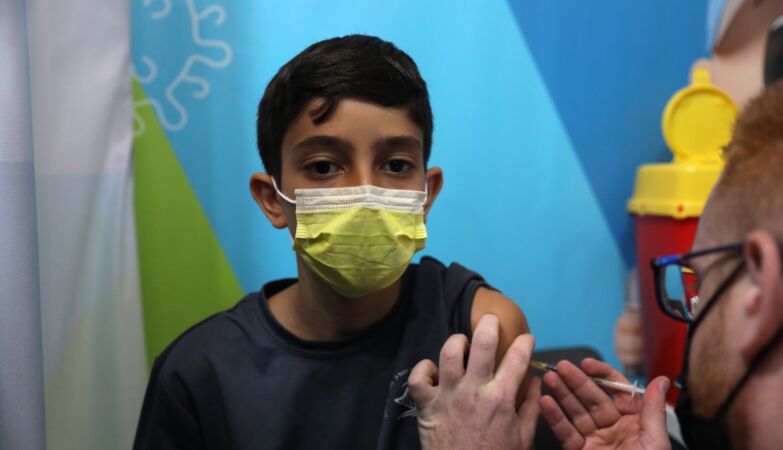 A child to be inoculated against Covid-19