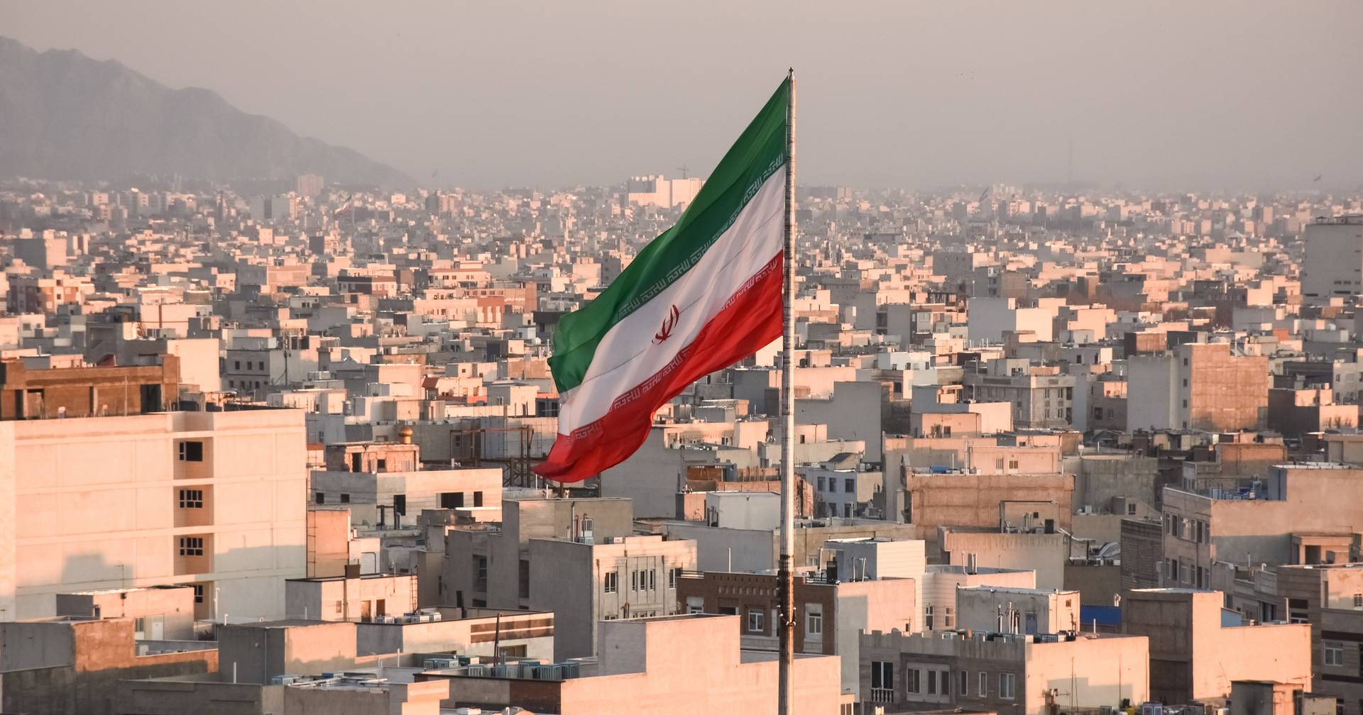 Will threaten with "firm and appropriate response" after reestablishing sanctions