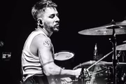 Junior Lima is clicked playing drums