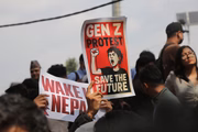Nepalese young people conduct a protest against the government in Catmandu