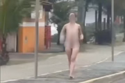 Woman walked naked when she was approached by guards and confessed to killing her father