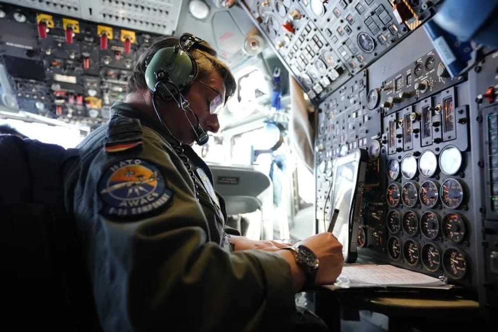 A member of the E-3 crew is preparing for a four-hour surveillance (Claudia Otto/AP)