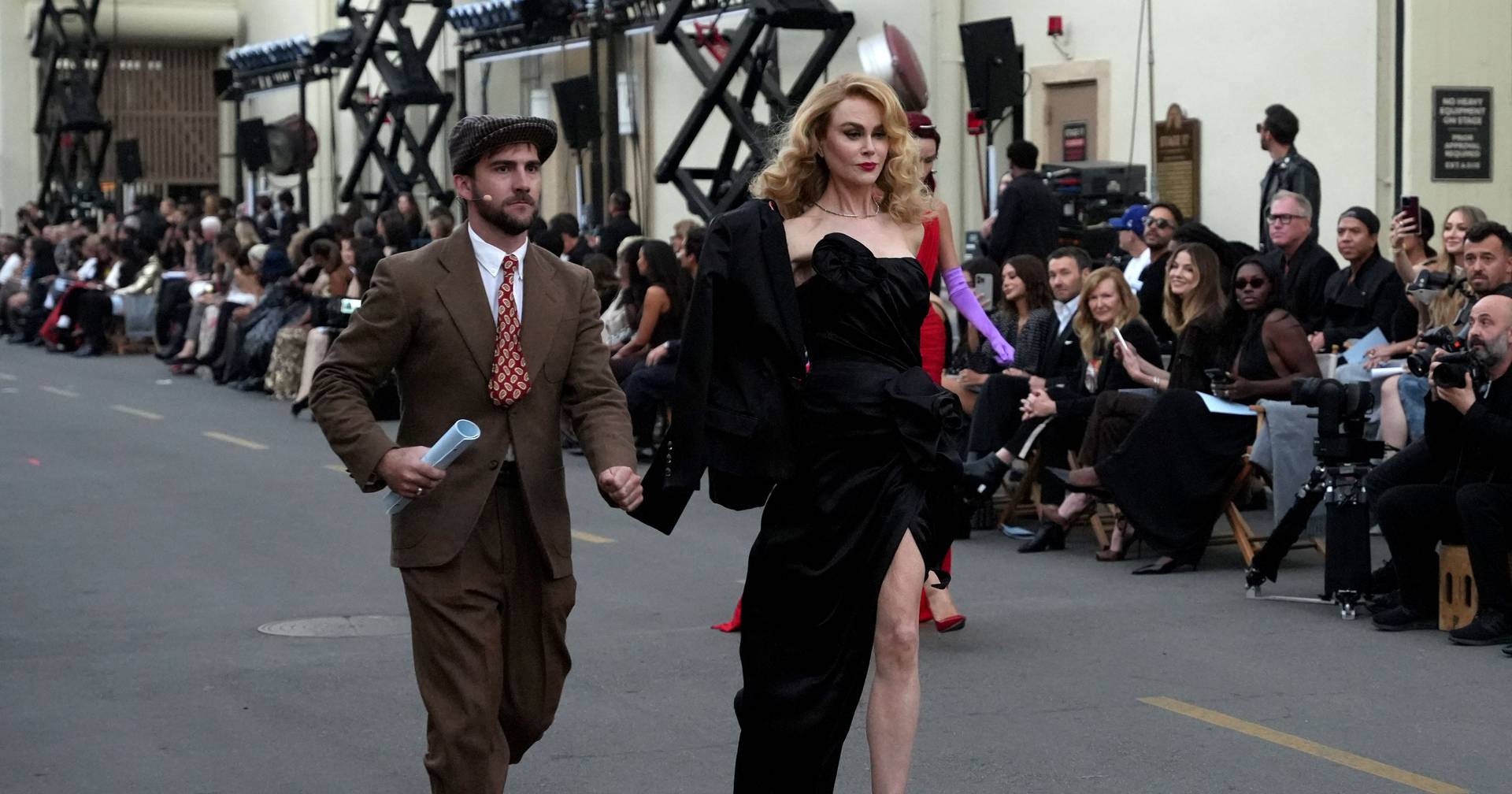 Vogue fashion show featuring Hollywood stars raises funds for costume designers affected by fires