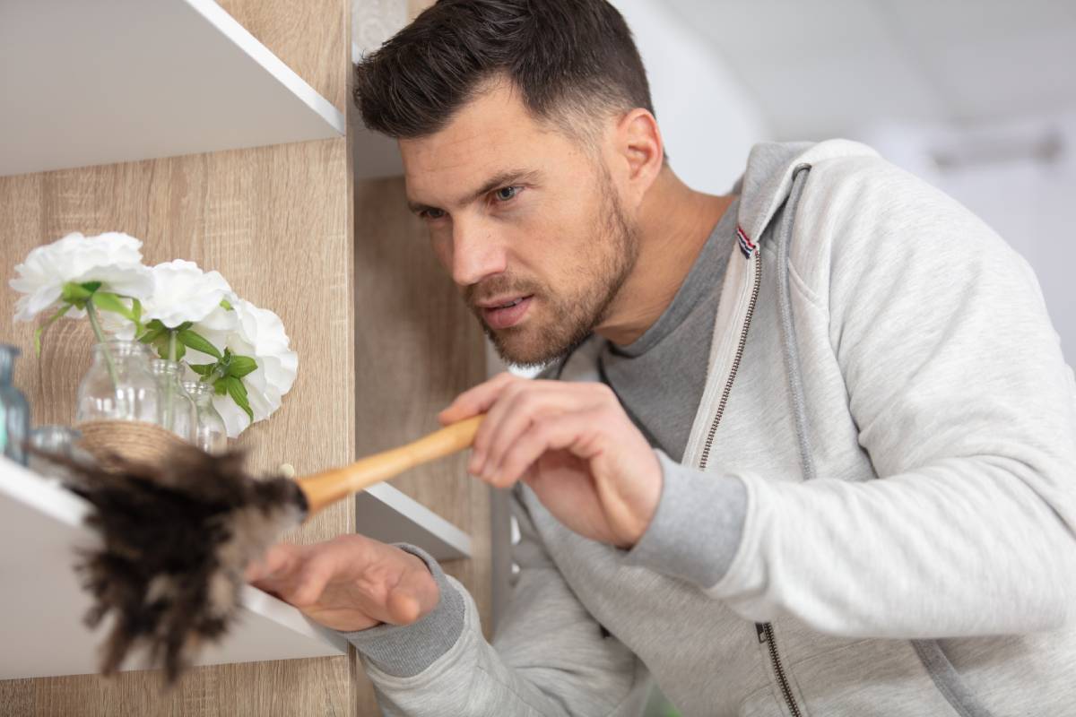 Man dusting