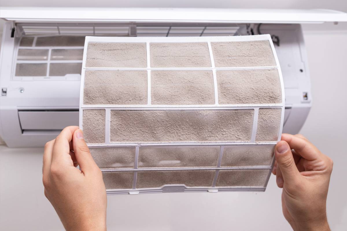 Removing air conditioner filters for cleaning