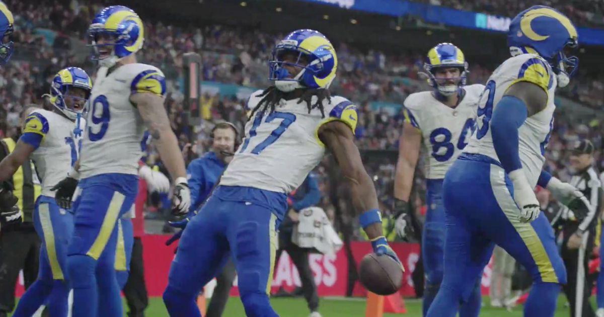 NFL players celebrate with CR7 during game in London