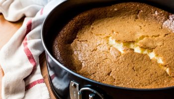 A good pastry chef's trick will save a cracked cheesecake. It will be smooth and fluffy like a cloud