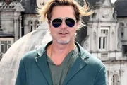 Brad Pitt poses in sunglasses Brad Pitt poses in sunglasses