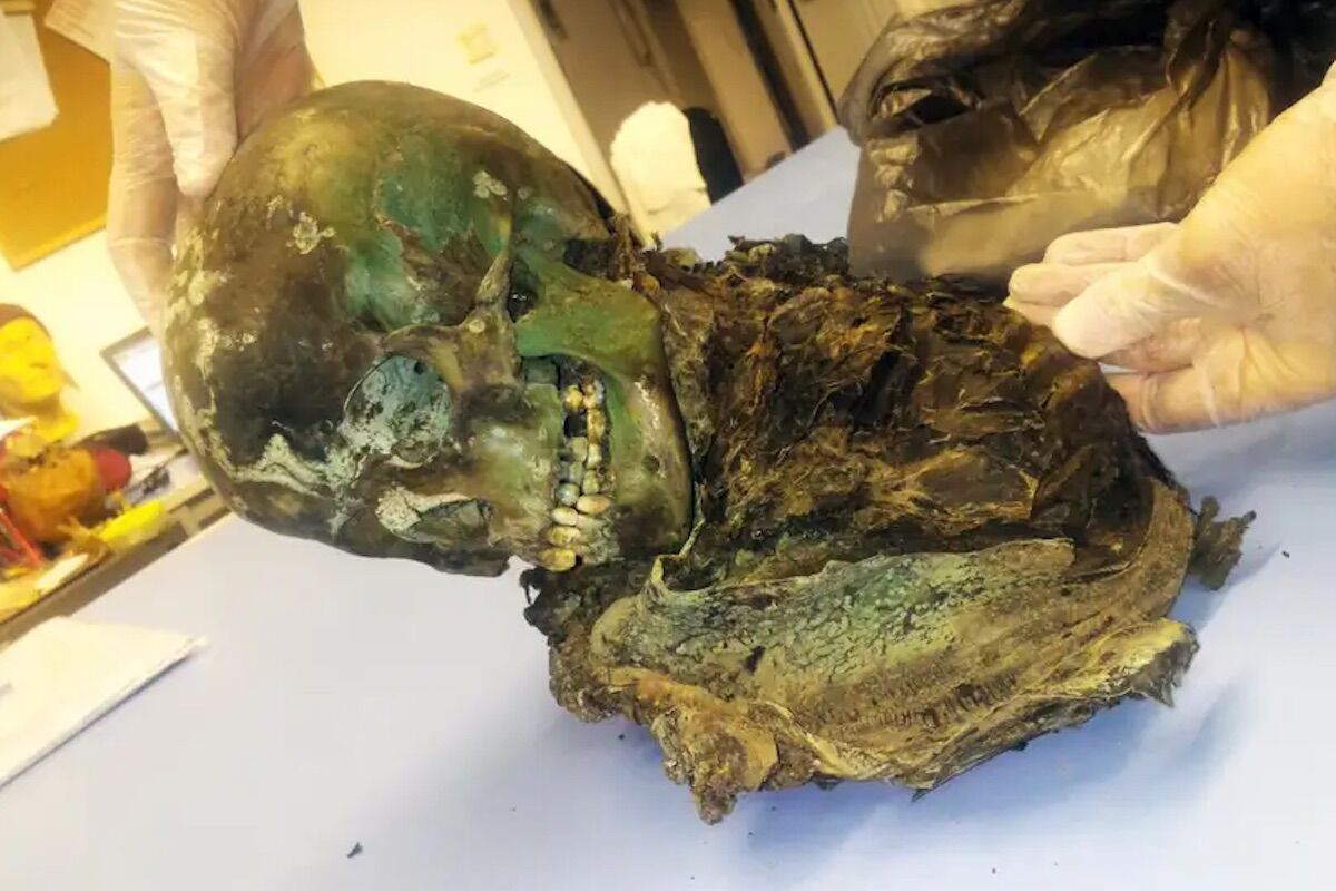 Body of mummified boy turned green inside a copper coffin