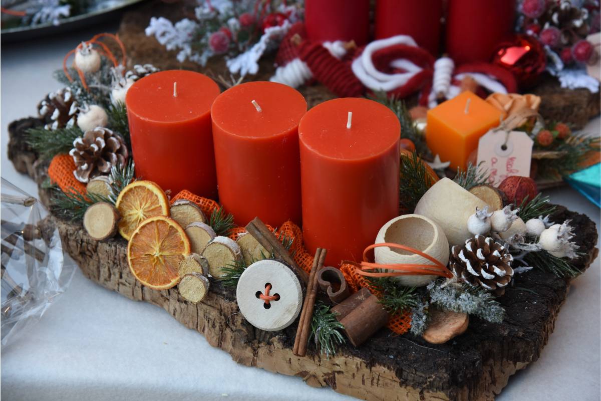 compositions with pine cones, candles and dried fruit