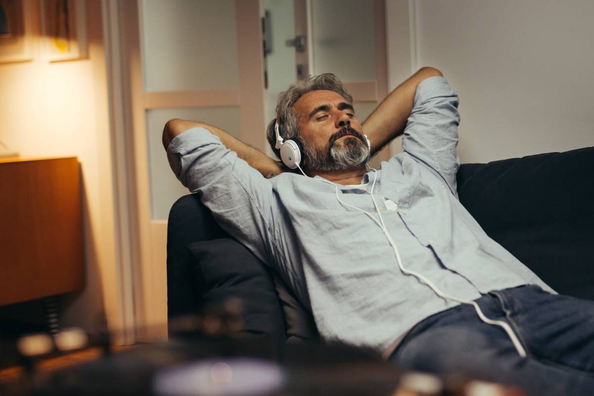 man enjoying slowness on sofa