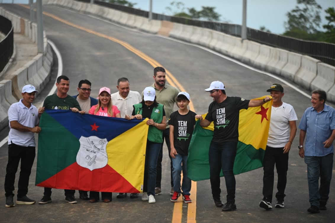 Gladson and Sula cross the Siberian Bridge celebrating a historic milestone for Xapuri