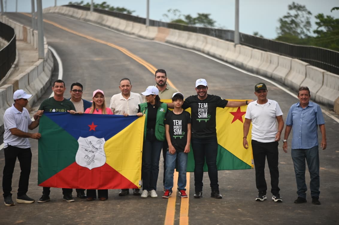 Gladson and Sula cross the Siberian Bridge celebrating a historic milestone for Xapuri