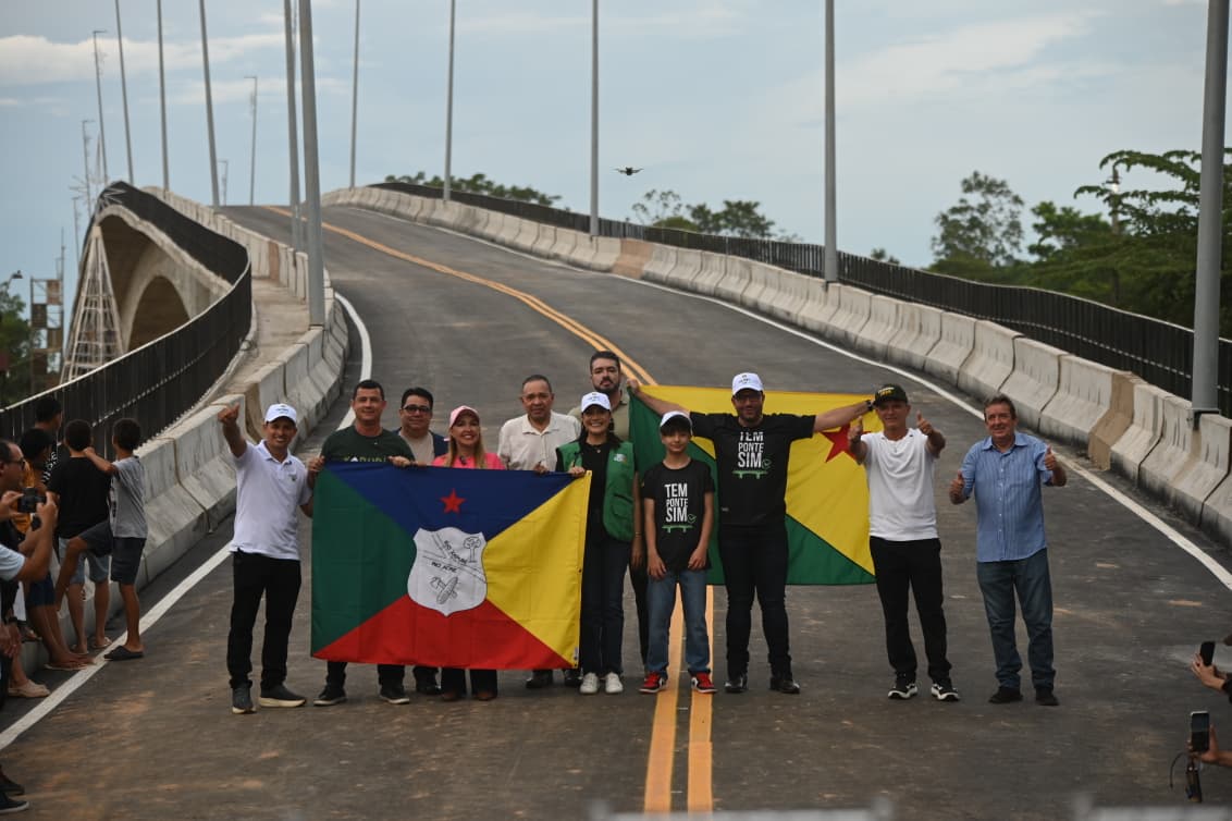 Gladson and Sula cross the Siberian Bridge celebrating a historic milestone for Xapuri