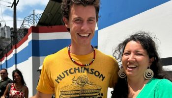 Shawn Mendes visits the Chico Mendes Committee space at COP30 and takes a photo with the environmentalist's granddaughter