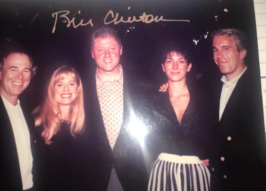 One of the published photos in which Bill Clinton appears with Epstein