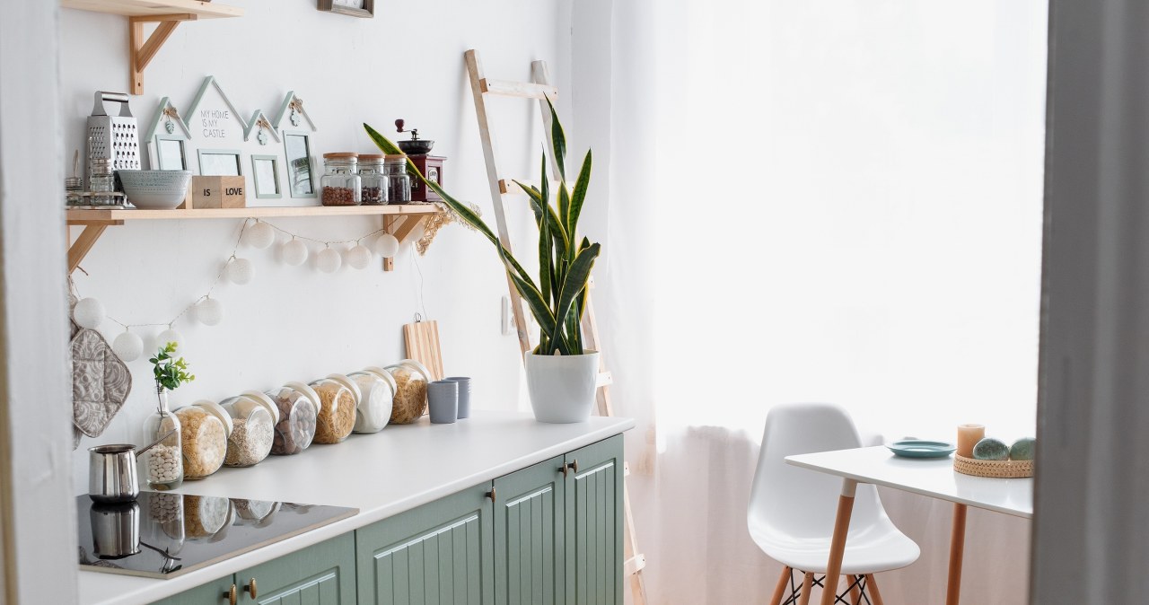 The sage color most often appears on the fronts of kitchen cabinets /Pixel