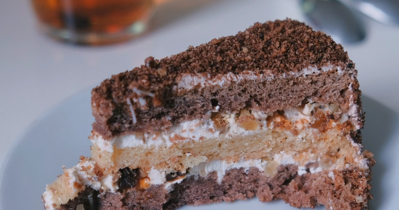 Chocolate sponge cake, creamy cream and orange accent. This cake is amazing