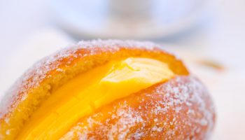 Portuguese donut filled to the brim with cream. It melts in your mouth like fluff
