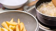 Add to fries before frying. They will be golden, perfectly crispy and will not absorb fat